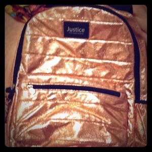 Justice rose gold book bag
